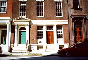 [Color photograph of adjacent doorways, West Madison St., Baltimore