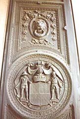 [color photograph of reverse of State Seal, State House entrance door, Annapolis, Maryland]